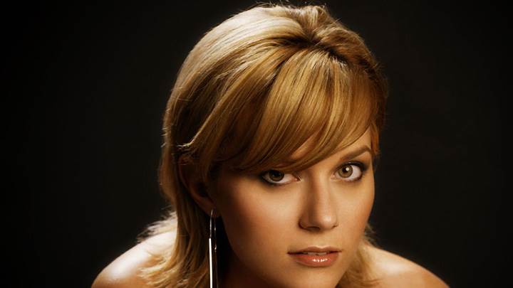 Hilarie Burton Looking At Camera Face Closeup At Black Background